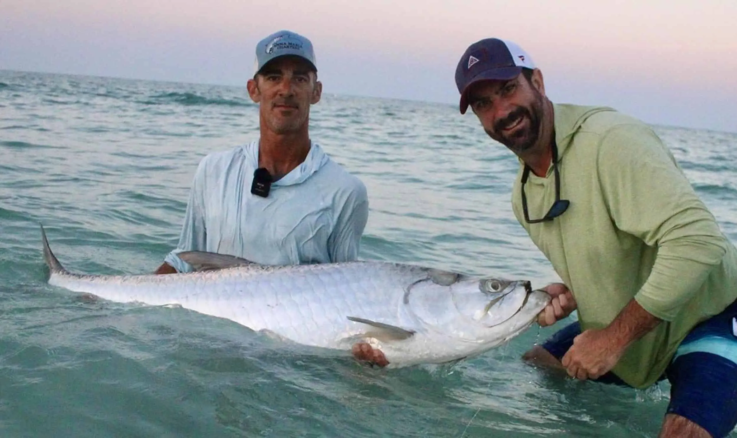 Captain David White Fishing Charters client with their catch