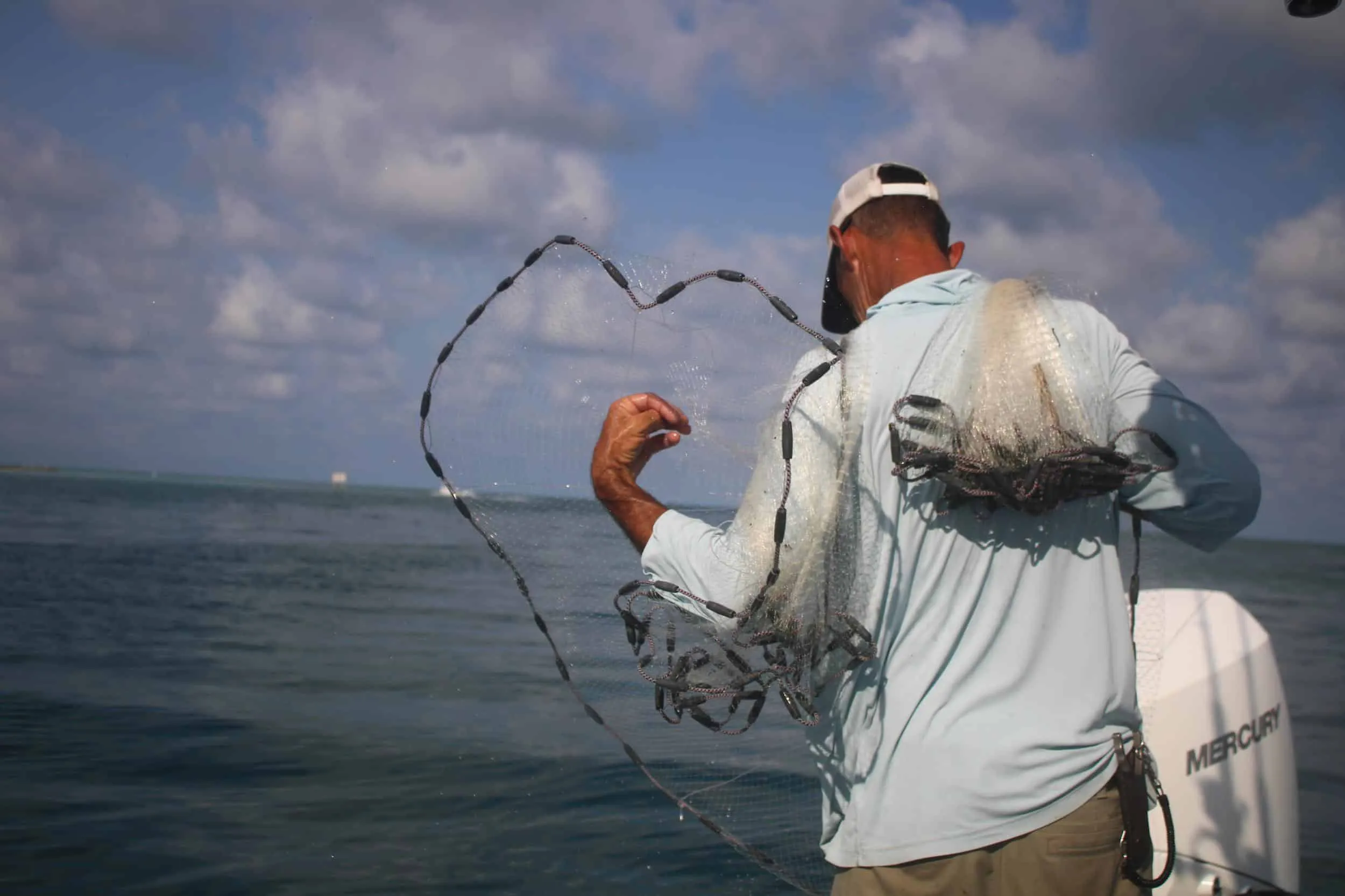 Captain David White Fishing Charters client with their catch