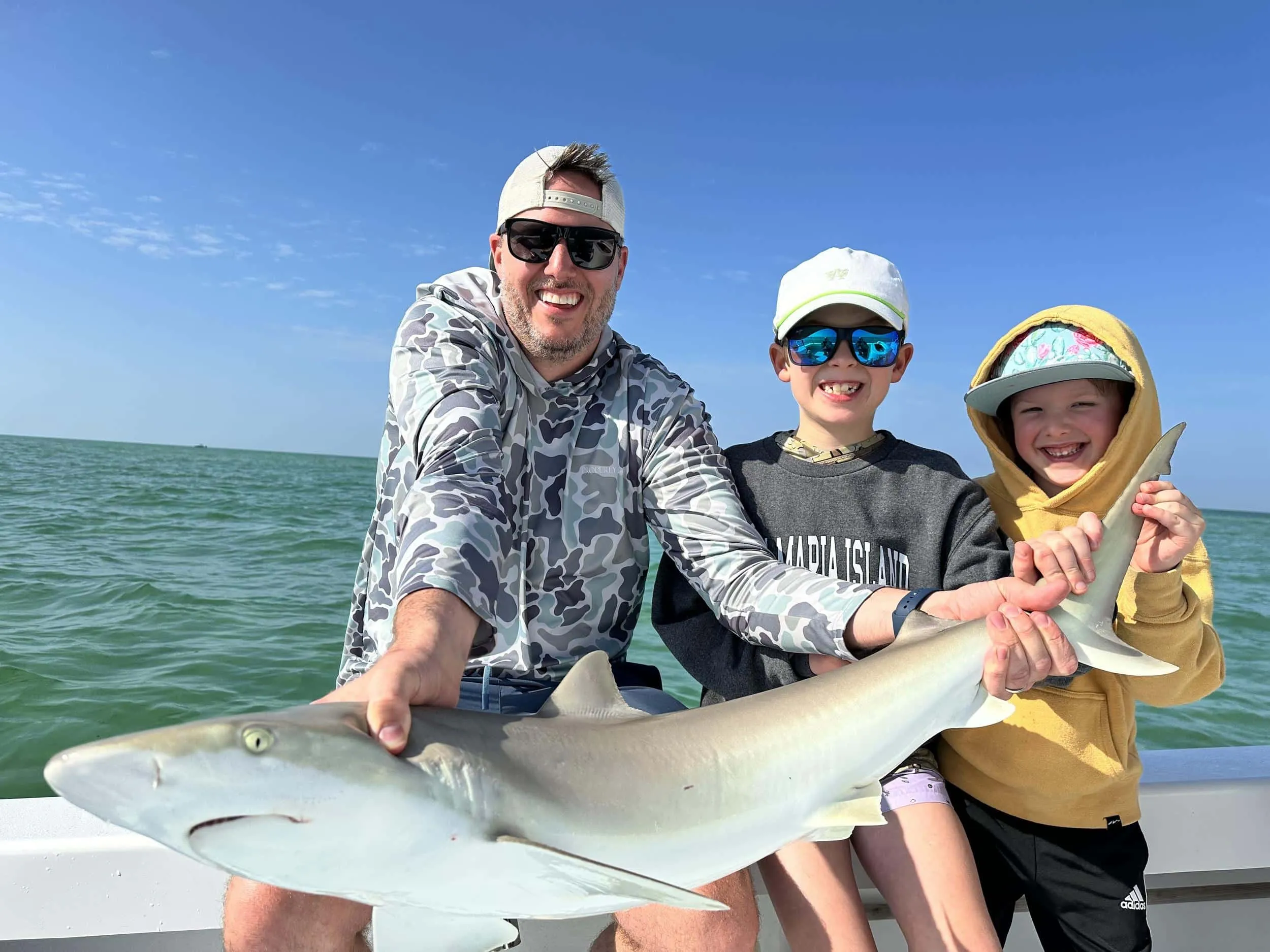 Captain David White Fishing Charters client with their catch